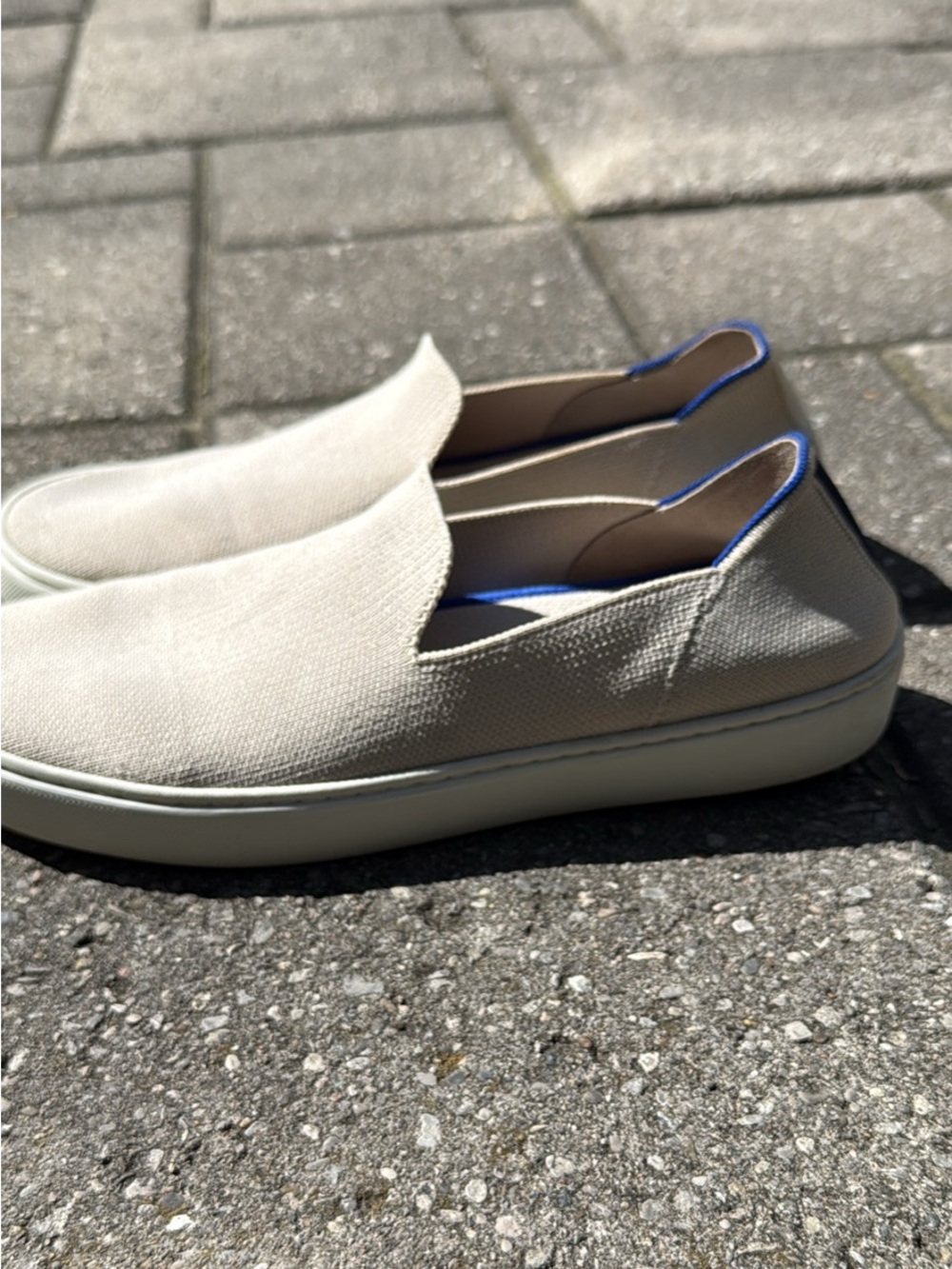 Rothy's Beige Slip-On Flats with Blue Trim